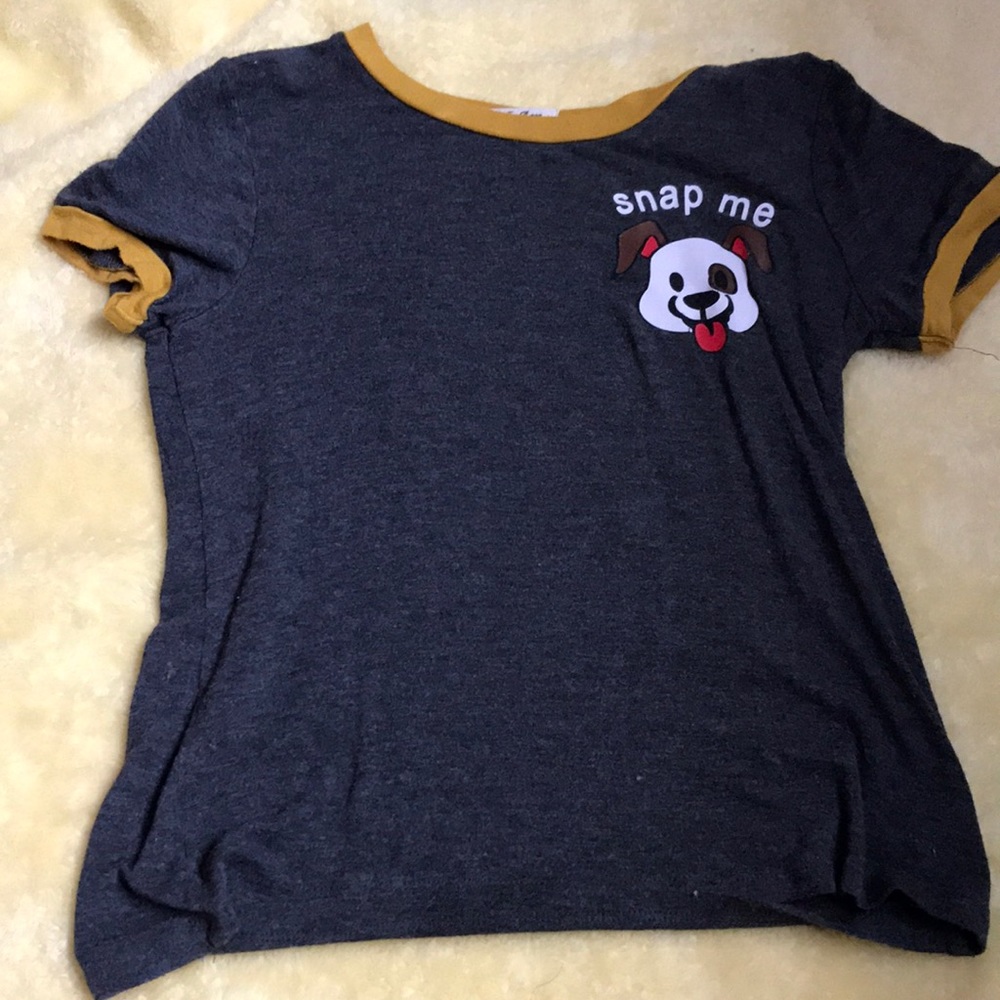 a cute little shirt that says snap me 💕
